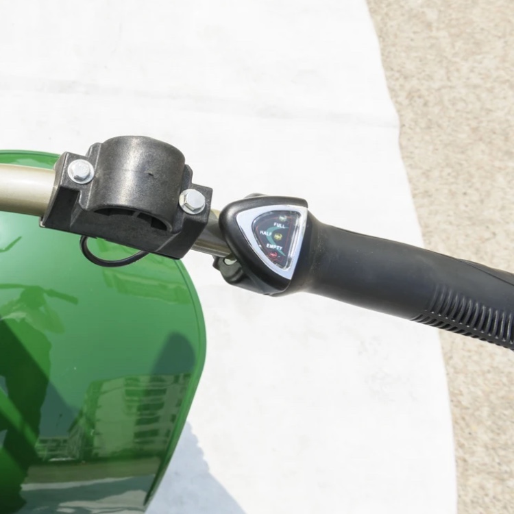 G3 Golf Buggy throttle grip with built-in indicator, mounted on the handlebar of a green golf buggy